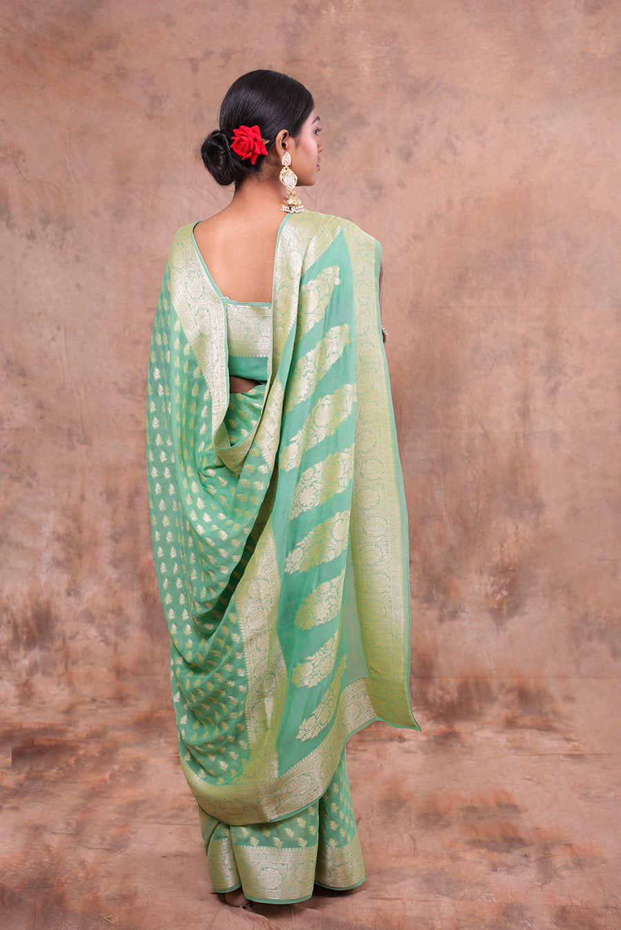Mint Green Banarasi Jacquard Saree with Gold Zari Butta & Woven Border